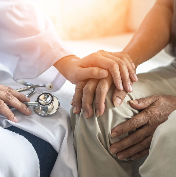 Doctor at South Bay Wellness Center evaluating a patient for pain